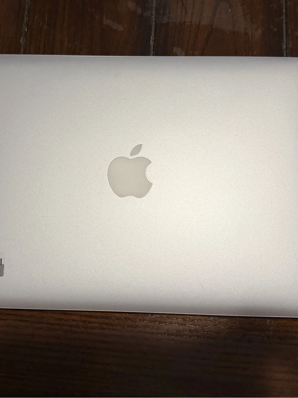 Apple Silver MacBook Top-View with Apple Logo